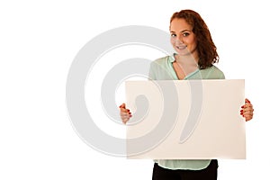 Sign board. Woman holding big white blank card. Positive emotion