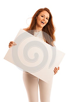 Sign board. Woman holding big white blank card. Positive emotion