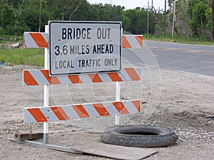 Sign that bridge is out and closed, with only local traffic permitted