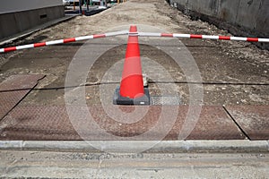 The sign Caution area under construction on traffic cone, Japan