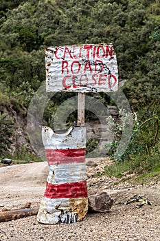 Sign caution road closed in the Hell's Gate National Park, Ken