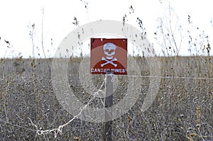 Sign Danger Mines for minefields set on the field