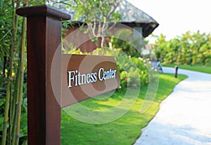 Sign of direction to fitness center of a resort and spa