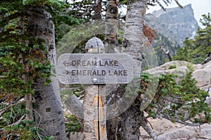 Sign for directions to Dream and Emerald Lake in Rocky Mountain National Park on the hiking trail