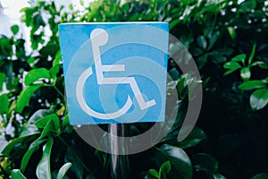 sign with disability symbol. Icon board of a person with a wheelchair.