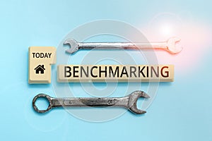 Sign displaying Benchmarking. Business idea Evaluate something by comparison with a standard Strategy