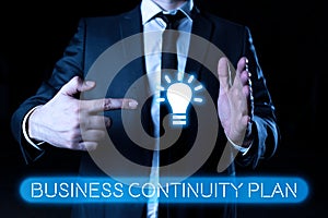 Sign displaying Business Continuity Plan. Conceptual photo creating systems prevention deal potential threats