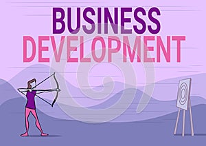 Sign displaying Business Development. Word for Implement Growth Value within and between company Lady Archer