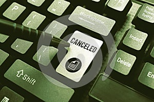 Sign displaying Canceled. Word Written on to decide not to conduct or perform something planned or expected Publishing photo