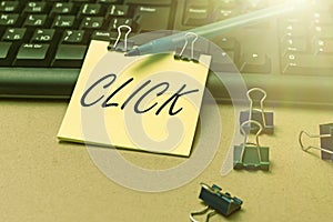 Sign displaying Click. Conceptual photo Act of pressing a button on a mouse similar device Sharp short sound Multiple