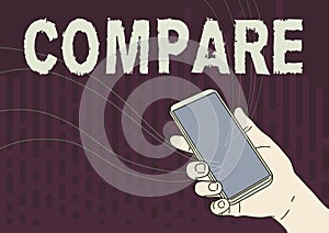 Sign displaying Compare. Internet Concept Estimate Measure Note the similarities dissimilarities between Hand Holding photo