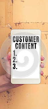 Sign displaying Customer Content. Business concept customers are devoted to a company s is products or services Mobile