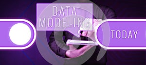 Text sign showing Data Modeling. Business concept process of transferring data between data storage systems