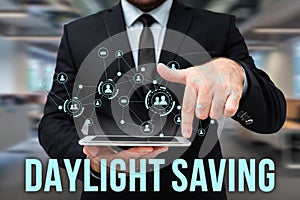 Sign displaying Daylight Saving. Conceptual photo Storage technologies that can be used to protect data Man In Uniform