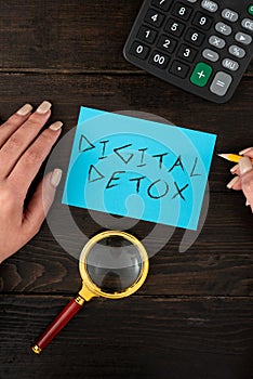 Sign displaying Digital Detox. Conceptual photo Free of Electronic Devices Disconnect to Reconnect Unplugged Hands Of