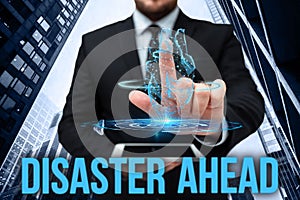 Sign displaying Disaster Ahead. Business approach Contingency Planning Forecasting a disaster or incident Hand Touching