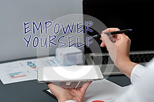 Sign displaying Empower Yourselftaking control of life setting goals positive choices. Business idea taking control of