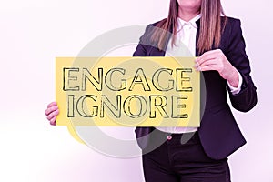 Sign displaying Engage Ignore. Business concept Silent Treatment Manipulative Punishment Sulking Shunning