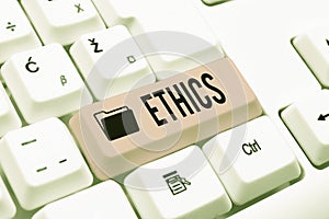 Sign displaying Ethics. Concept meaning the moral philosophy or code of morals practiced by a person Typing Online