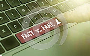 Sign displaying Fact Vs Fake. Business showcase Rivalry or products or information originaly made or imitation photo