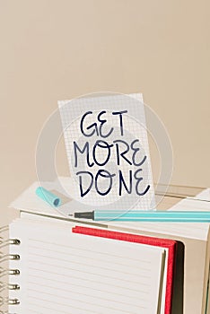 Sign displaying Get More Done. Word for Checklist Organized Time Management Start Hard work Act Hand Holding Panel Board