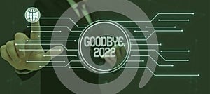 Sign displaying Goodbye 2022. Word Written on New Year Eve Milestone Last Month Celebration Transition photo