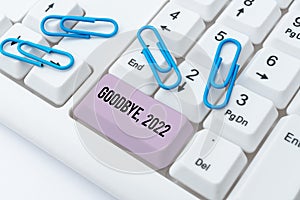 Writing displaying text Goodbye 2022. Business idea New Year Eve Milestone Last Month Celebration Transition photo