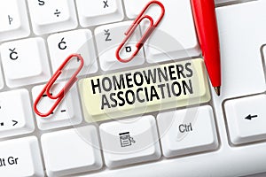 Sign displaying Homeowners Association. Conceptual photo Organization with fee for upkeeps of Gated Community Abstract