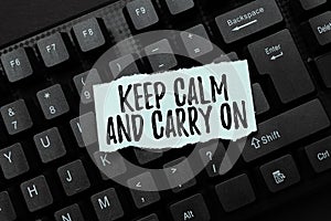 Sign displaying Keep Calm And Carry On. Concept meaning slogan calling for persistence face of challenge Creating Online