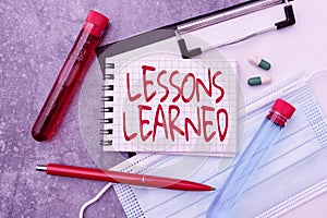 Sign displaying Lessons Learned. Business idea Promote share and use knowledge derived from experience Researching