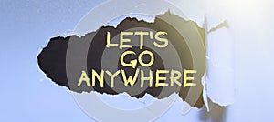 Sign displaying Let's Go Anywhere. Business showcase visit new places to meet strangers, enjoy, and relax