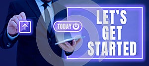 Sign displaying Lets Get Started. Concept meaning encouraging someone to commence or begin doing something