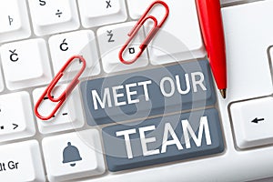 Sign displaying Meet Our Team. Business approach introducing another person to your team mates in the company