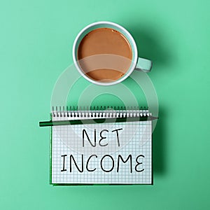 Sign displaying Net Income. Word for the gross income remaining after all deductions and exemptions are taken