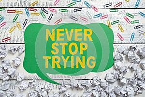 Sign displaying Never Stop TryingDo not give up Continue to Try Again Keep on Doing. Business approach Do not give up