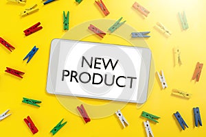 Sign displaying New Product. Internet Concept goods and services that differ in their characteristics Colorful Pegs