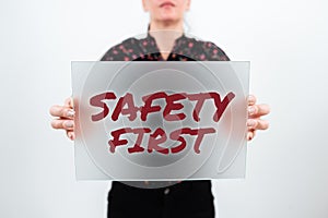 Sign displaying Safety First. Business showcase Avoid any unnecessary risk Live Safely Be Careful Pay attention
