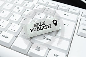 Sign displaying Self Publish. Business concept writer publish piece of ones work independently at own expense Typing New