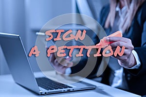 Sign displaying Sign A Petition. Word Written on Support a cause by signing paper with an agreement Piece Of Paper On