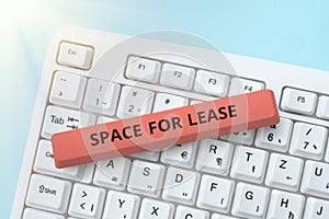 Sign displaying Space For Lease. Conceptual photo Available location for rent to use for commercial purposes Hand