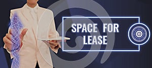 Sign displaying Space For Lease. Word for Available location for rent to use for commercial purposes Businessman