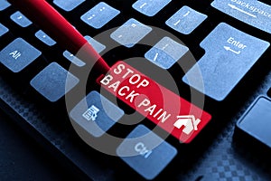 Sign displaying Stop Back Pain. Concept meaning put an end on the pain felt in the low or upper back Inputting Important