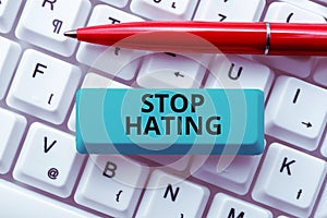 Sign displaying Stop Hating. Internet Concept cease hostility and aversion deriving from fear, anger, or sense of injury