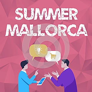 Sign displaying Summer Mallorca. Business showcase Spending the holiday season in the Balearic islands of Spain Two Men