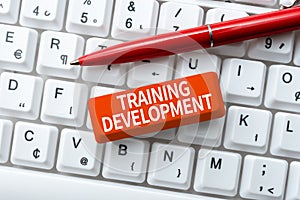 Sign displaying Training Development. Conceptual photo Learn and Expand skills and knowledge Program