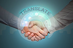 Sign displaying Translate. Conceptual photo Another word with same equivalent meaning of a target language Hands shaking photo
