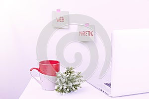 Sign displaying Web Marketing. Internet Concept Electronic commerce Advertising through internet Online seller Tidy