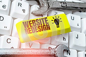 Sign displaying Website Redesign. Business idea modernize improver or evamp your website's look and feel photo