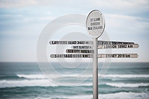 Sign with distances, Dunedin, New Zealand