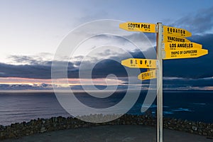 Sign with distances in km and nm from Cape Reinga